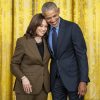 Former President Barack Obama hugs Vice President Kamala Harris during an Affordable Care Act event with President Joe Biden, Tuesday, April 5, 2022, in the East Room of the White House. (Official White House Photo by Adam Schultz)